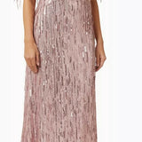 Woman wearing a dusty pink sequin fringe midi dress with puffed sleeves — Endless | Endless UAE