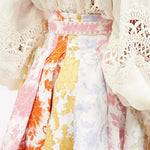 High-rise pleated floral-print poplin mini skirt with colorful pastel blooms — Zimmermann | Endless UAE