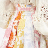 High-rise pleated floral-print poplin mini skirt with colorful pastel blooms — Zimmermann | Endless UAE