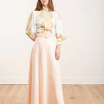 Super Eight Linen Skirt in cream, paired with patterned blouse — Zimmermann | Endless UAE