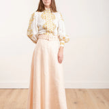 Super Eight Linen Skirt in cream, paired with patterned blouse — Zimmermann | Endless UAE
