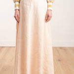 Super Eight Linen Skirt in cream, paired with patterned blouse — Zimmermann | Endless UAE