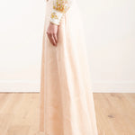 Super Eight Linen Skirt in cream, paired with patterned blouse — Zimmermann | Endless UAE