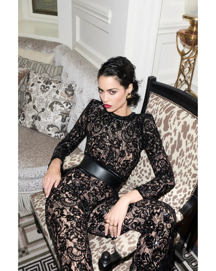 Black lace long-sleeve jumpsuit with studded belt and flared pants — Nadine Merabi | Endless UAE
